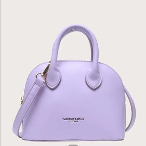 Brand new small lavender purse.